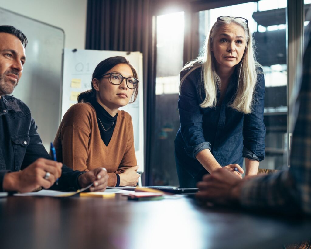 Business leaders discussing effective talent management strategies