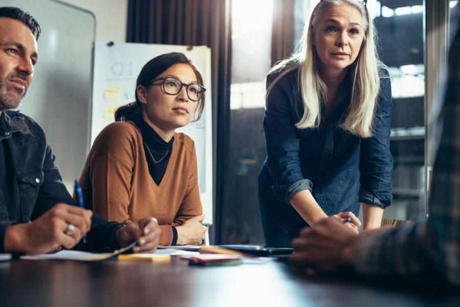 Business leaders discussing effective talent management strategies